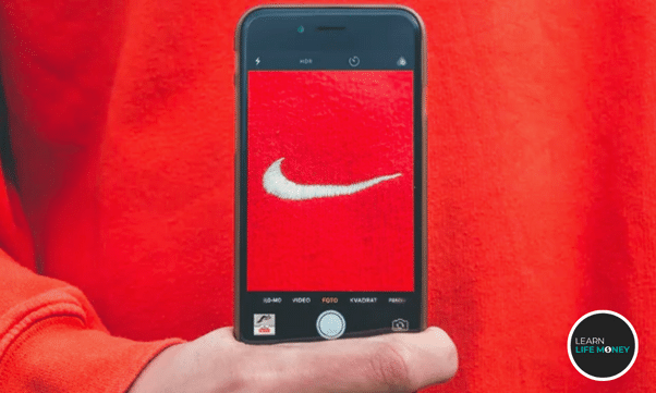 A phone camera capturing the Nike logo.