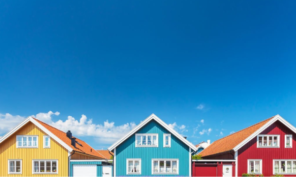 Colorful houses in front of a blue sky