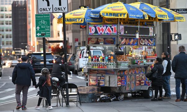 Street food cart in Manhattan Street, in New York City, United States.