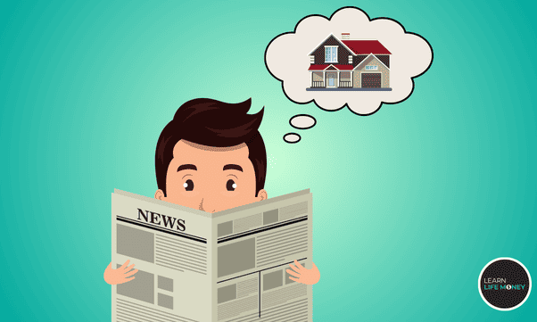 A man reading newspapers in search for a house.