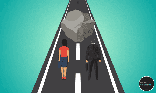 Two persons are crossing a road blocked by a huge rock.