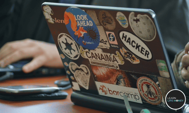 A laptop full of stickers.