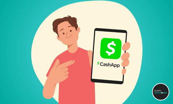 A man holding a phone with Cash App.