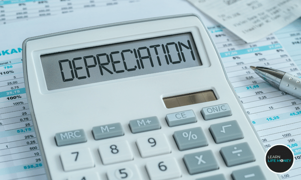 A calculator with "depreciation" written on it.